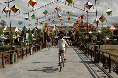 Cycling-over-Cam-Nam-Bridge walking in the footsteps of history Hoi An